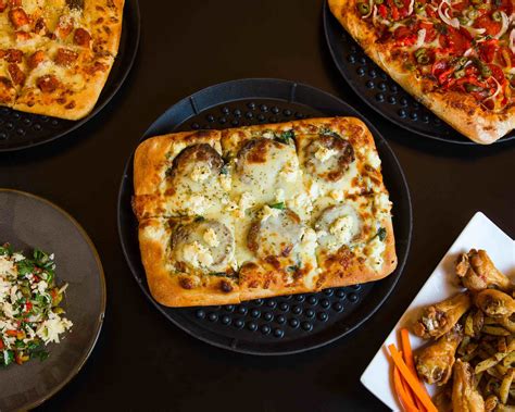 Naked city pizza - The opening comes 20 years after Chris moved to Vegas, where he opened the first Naked City Pizza in 2009. His brother joined him nine years ago to run the second location.